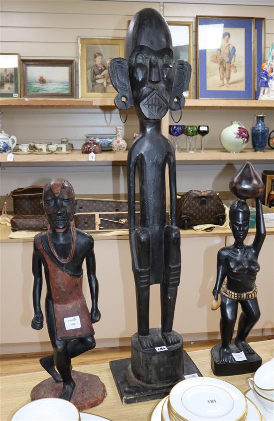 Three African figural carvings tallest 104cm